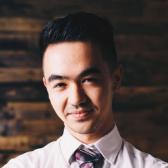 profile picture of a man with a shirt and tie.